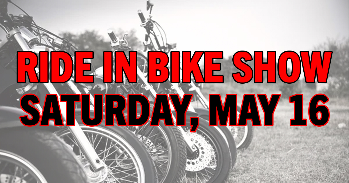 Several motorcycles lined up on grass with large red and black text over the image that reads: 