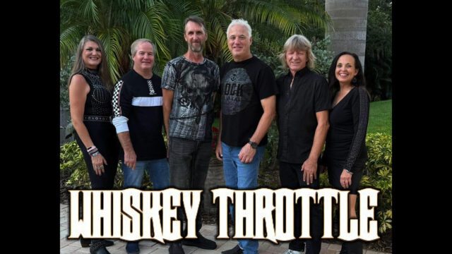 Six adults stand in a row outdoors in front of palm trees, all smiling. The text “WHISKEY THROTTLE” appears in large bold letters at the bottom.